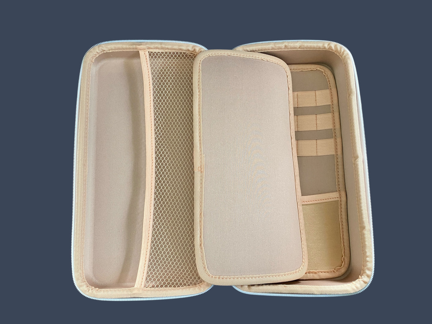 Beige travel case with compartments